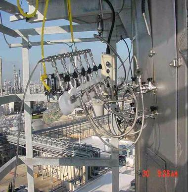 External sampling apparatus with multiple valves and sample lines.